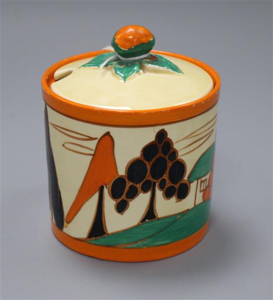 A Clarice Cliff Orange Trees and House preserve jar and cover height 11.5cm